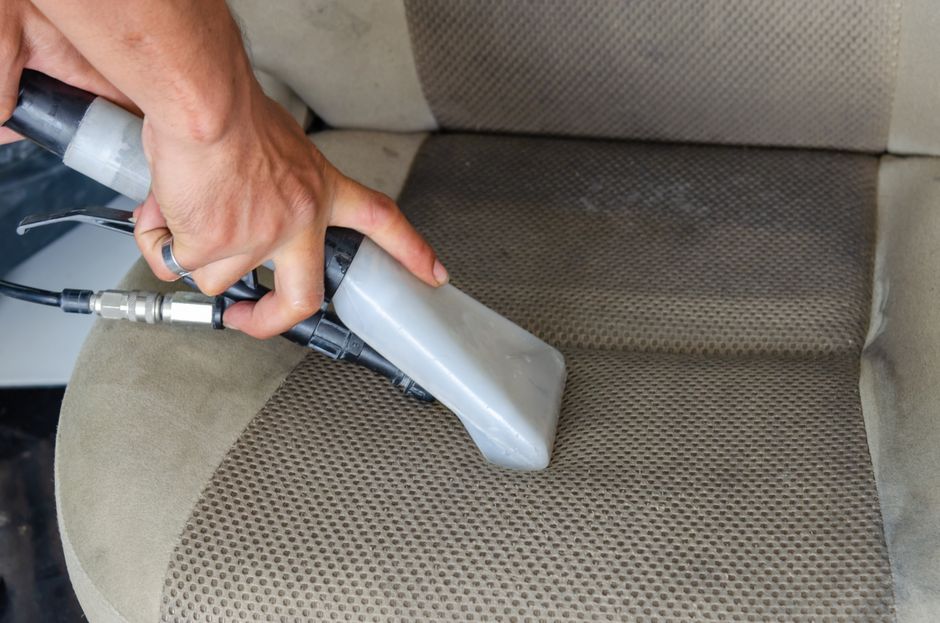 Deep cleaning and sanitizing a car interior seat